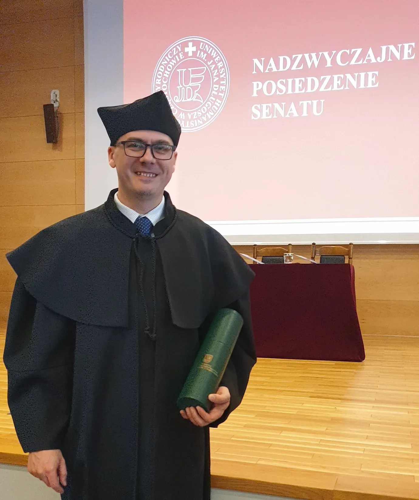 Łukasz Herok at the ceremonial presentation of doctoral diplomas